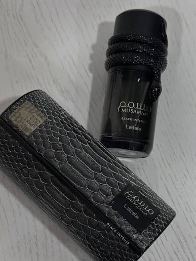 عطر و ادکلن مصمم بلک اینتنس لطافه